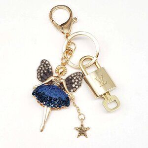 Authentic Louis Vuitton Lock & Key with unbranded Fairy Bagcharm, Keycharm